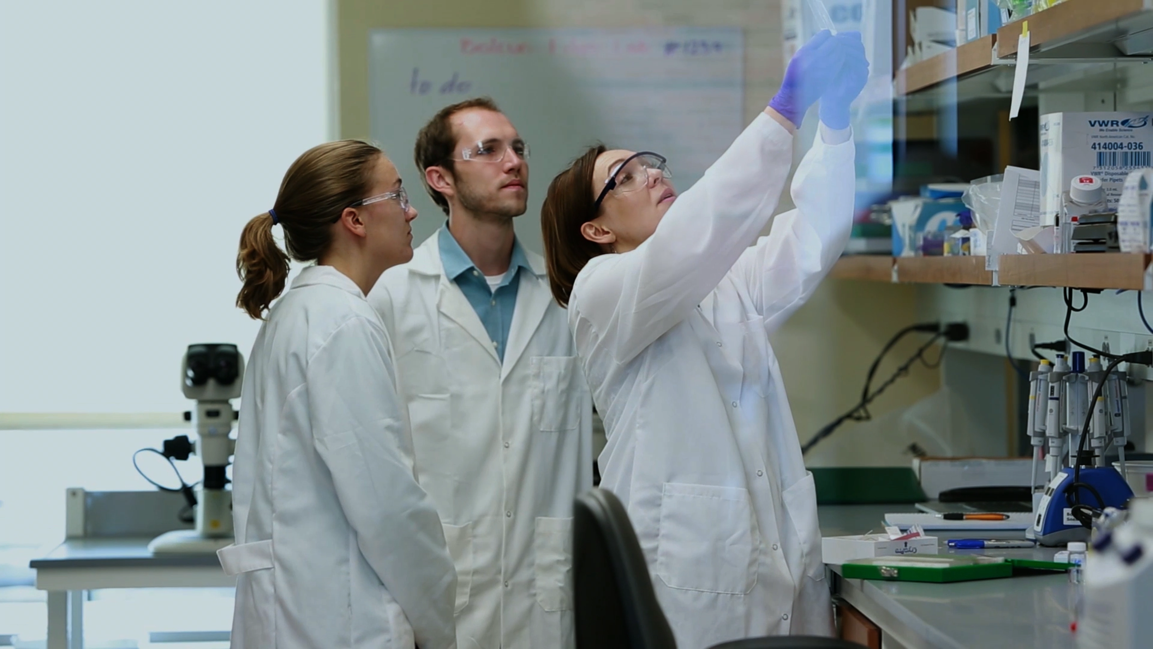 Scientist filmed on location during a Jackson Laboratory facility video production